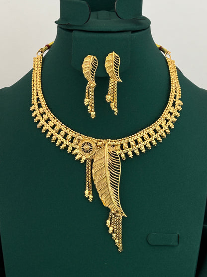 Gold Plated Leaf Motif Necklace Set with Delicate Dangling Beads for Ethnic Style