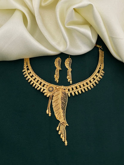 Gold Plated Leaf Motif Necklace Set with Delicate Dangling Beads for Ethnic Style